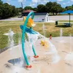 Arc Tipping Bucket with Splash Canopy
